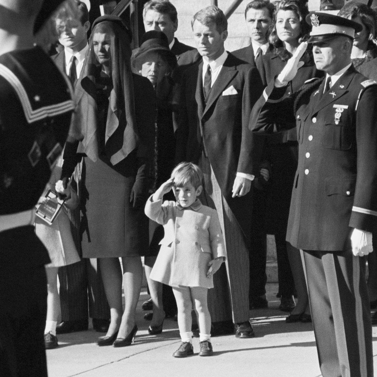 john f kennedy jr saluting at his fathers funeral